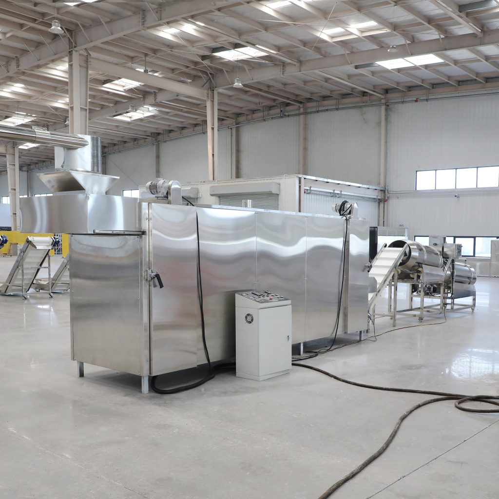 Stainless steel food processing line arranged inside the ZEKO machinery workshop